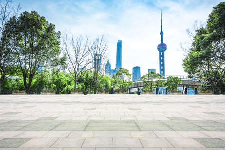 cityscape and skyline of shanghai from empty marble floor