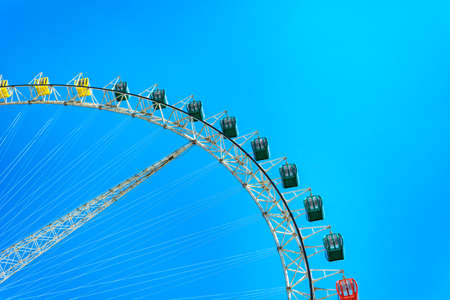 Ferris wheel on cloudy sky backgroundの写真素材