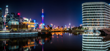 SHANGHAI, CHINA - MARCH 25: Pudong district view from The Bund waterfront area on March 25, 2016 in Shanghai, China. Pudong is a district of Shanghai, located east of the Huangpu River.のeditorial素材