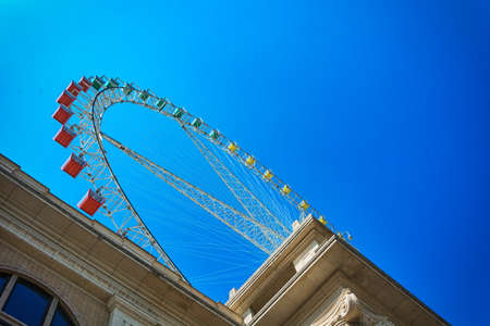 Ferris wheel on cloudy sky backgroundのeditorial素材