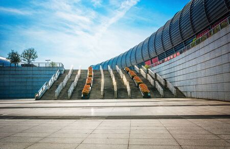 long empty footpath in modern city square with skyline.のeditorial素材