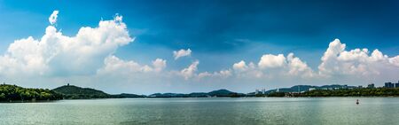 summer landscape with lake at sunny dayの写真素材