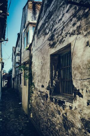 road and houses in XIdi - road and houses in Xidi, Anhui, China, is shown in circa Dec. 2011, which is famous for its kept old style village inclusive road, houses.のeditorial素材