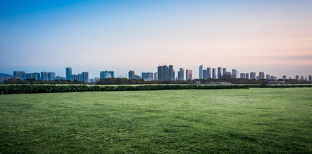 morning sunrise city skyline park lake clear calm waterの写真素材