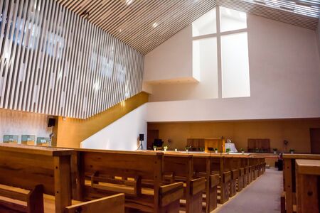 Interior view of a modern church with empty pewsのeditorial素材