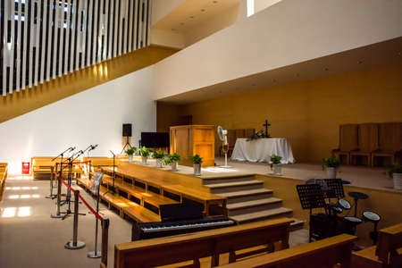 Interior view of a modern church with empty pewsのeditorial素材