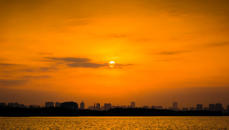 morning sunrise city skyline park lake clear calm water