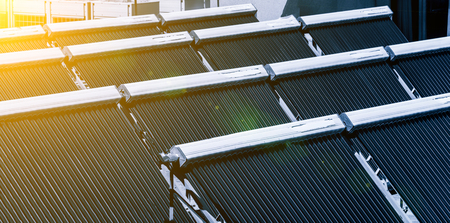 Solar water heater on roofの写真素材