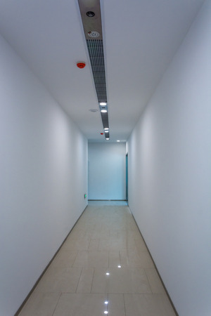 corridor with gray carpet and white wallのeditorial素材