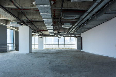 Unfinished interior of business center under construction in grey coloursのeditorial素材