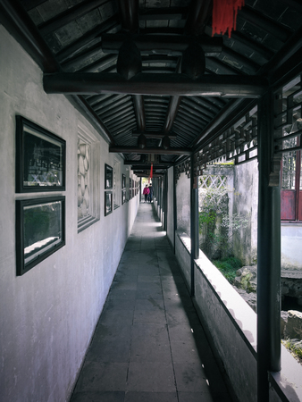 Long Corridor-one of Chinese classical garden buildings. Taken on the Zhuozhengyuan Park. The Park is one of Chinese classical gardens in Suzhou City.の写真素材