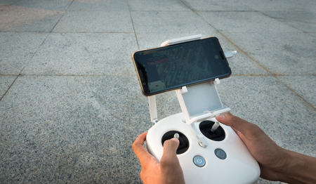 The UAV drone and a man's hands