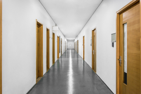 empty long corridor in the modern office building.のeditorial素材