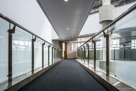 school, education and learning concept - empty school corridorのeditorial素材