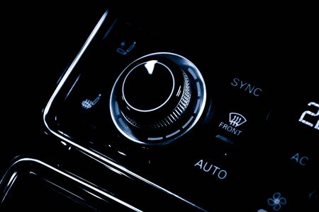Close up shot of luxury car audio controls