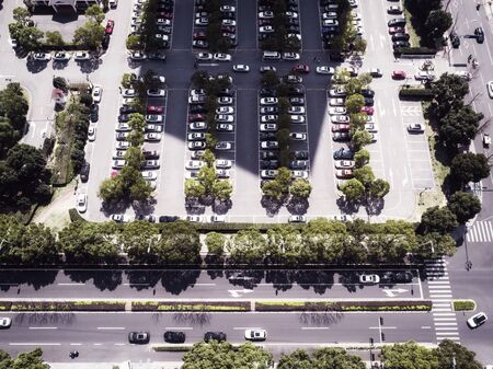 Car parking lot viewed from above, Aerial view. Top view