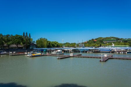 Scenery of Xuanguang pier where ferries stop for visiting Xuanguang Temple , located on South side of Sun Moon Lakeの写真素材