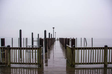 pier into fogの写真素材