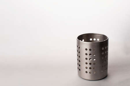 Kitchen utensils in a utensil holder isolated in white backgroundの写真素材