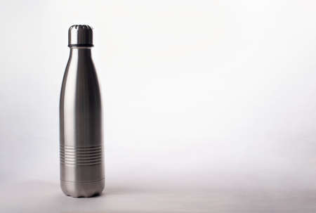 Metal water bottle on white background, Stainless steel flaskの写真素材