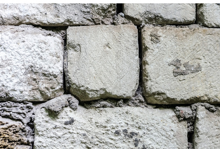 Old wall of white stoneの写真素材