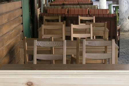An empty street Cafe without people early in the morning