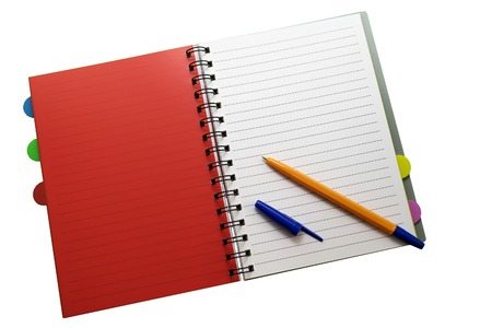 the notepad and pen on white isolated background.の写真素材