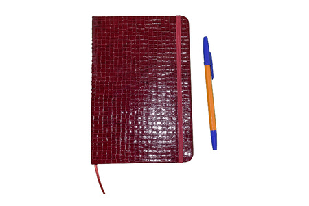 the notepad and pen on white isolated background.の写真素材