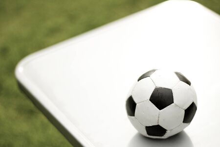 Toy football on tableの写真素材