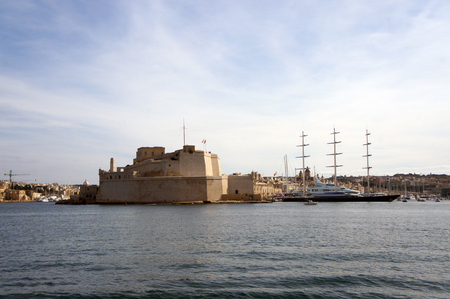 Panorama of Grand Harbor and Birgu (Vittoriosa) - Three Cities in Malta with Fort Saint Angelo and luxury yachtsの写真素材