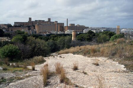 St. Luke's Hospital in Pieta, Malta, as visible from fortifications of Florianaの写真素材