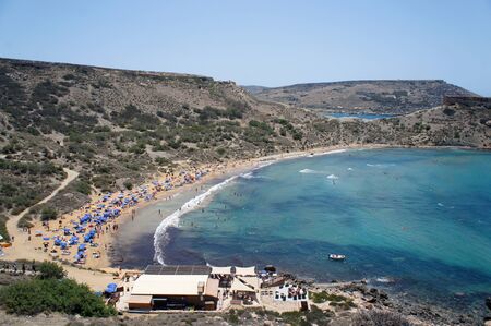 Panorama of Ghajn Tuffieha (GÄ§ajn TuffieÄ§a) harbor and beach, Golden Bay, Maltaの写真素材