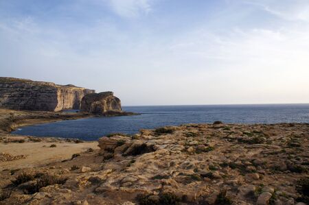 Fungus Rock and landscape of Dwejra Bay next to Azure Window (it-Tieqa Å»erqa) in Xlendi, Gozoの写真素材