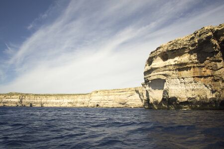 Boat trip next to Dwejra Cliffs in San Lawrenz, Gozo, Maltaの写真素材