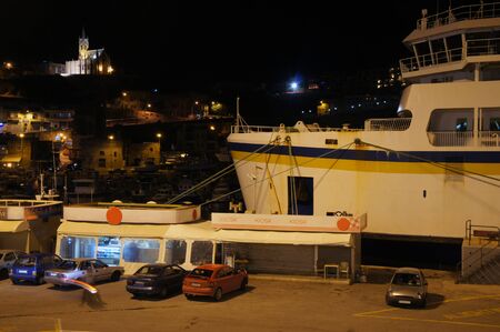 Ferry mooring in Mgarr Harbour (route between Cirkewwa, Malta and Mgarr, Gozo)の写真素材