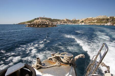 Landscape of Mgarr Harbor in Gozo, Malta visible from yacht deckの写真素材