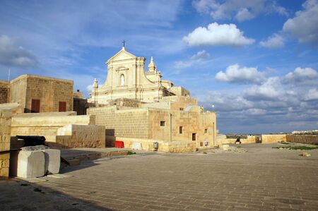 Side view of the Cathedral of the Assumption in the Cittadella of Victoria in Gozo, Maltaの写真素材