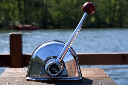 Throttle lever for an engine on a ship