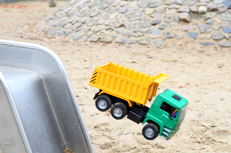 Truck flies from a slip on the playgroundの写真素材