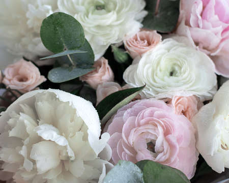 bouquet of pink and white peonies. flowers close-up. fresh bright blooming peonies flowers with dew drops on petalsの写真素材