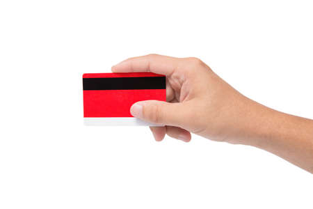 Red credit card holding on man handの写真素材