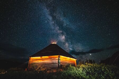 Ail the traditional home of the altaians against the background of the milky way in the night skyの写真素材