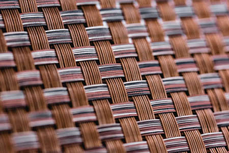 Brown plastic weaving texture, braided patternの写真素材