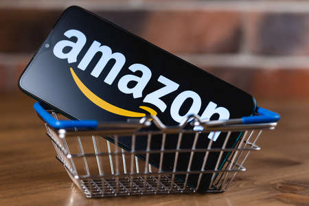 Kazan, Russia - May 14, 2021: Amazon is an American multinational technology company, which focuses on e-commerce, cloud computing, digital streaming, and artificial intelligence.のeditorial素材