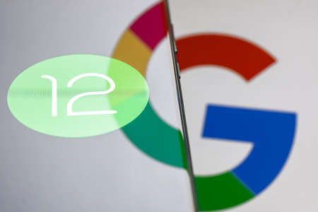 Kazan, Russia - May 29, 2021: Android is a mobile operating system. The twelfth version of the Android operating system developed by Google. Android 12 logo on smartphone screen.のeditorial素材