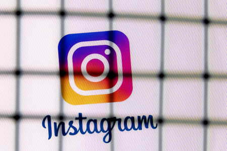 Kazan, Russia - Oct 21, 2021: The of the social network Instagram behind bars. The concept of...