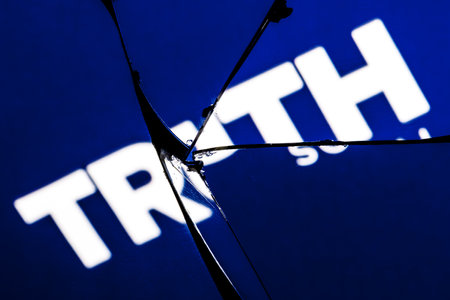 Kazan, Russia - Feb 22, 2022: of Truth Social network in reflection of broken mirror. The concept of problems in work of Truth Social.のeditorial素材