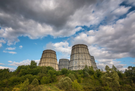 CHP tower on a background of clouds moving in the treesの写真素材