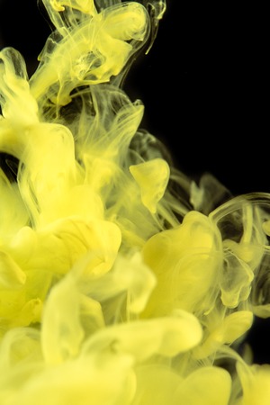 yellow ink in water photo art abstractの写真素材