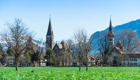 Beautiful scene of town with green field and trees at Interlakenの写真素材